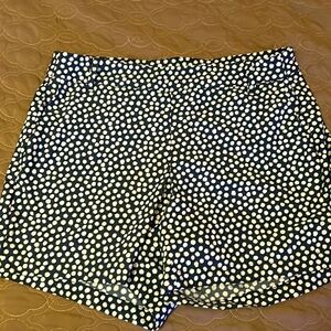 Spanx women’s shorts size large navy blue with white polkadots. Like new.